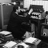 April 1963: Telstar's recording wizard Joe Meek, at work in his bedroom studio in Holloway Road, London. (Photo by John Pratt/Keystone Features/Getty Images)